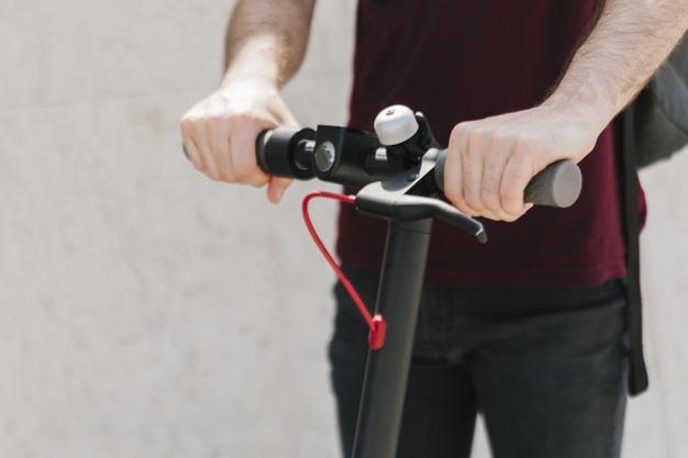 close-up-e-scooter-rider-with-defocused-background