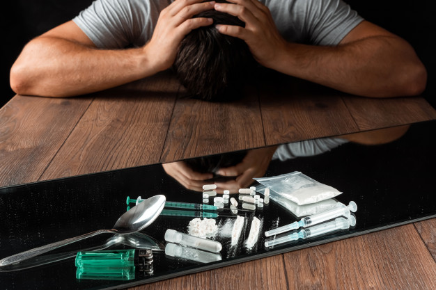 man-reaches-drugs-fight-against-drug-addiction