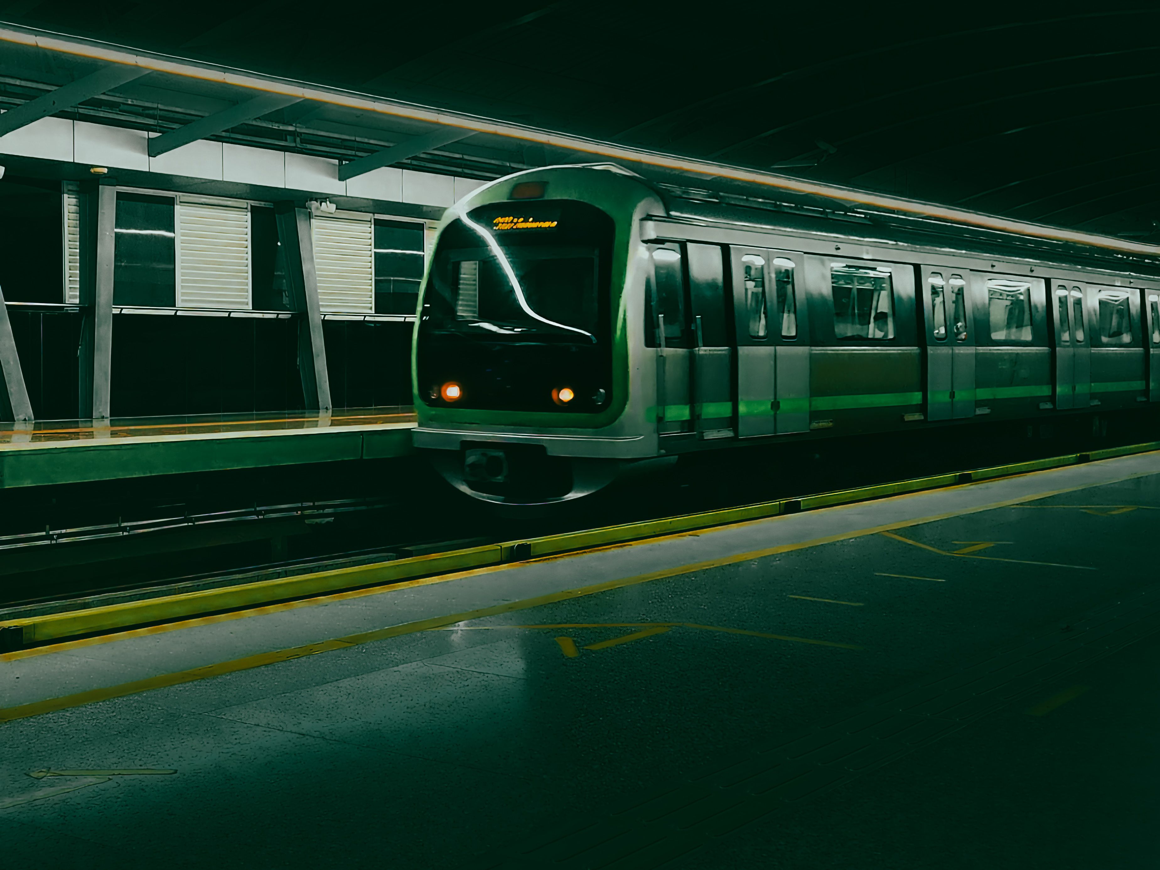 Sleek Bangalore Metro train at a modern station platform representing new urban transit in India